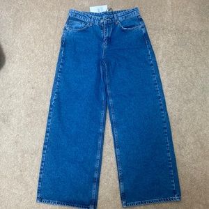 Free people Ragged low rise baggy blue jeans
